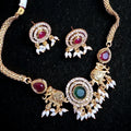 Temple elephant motif kundan necklace set with ruby stones and pearl drops with matching earrings