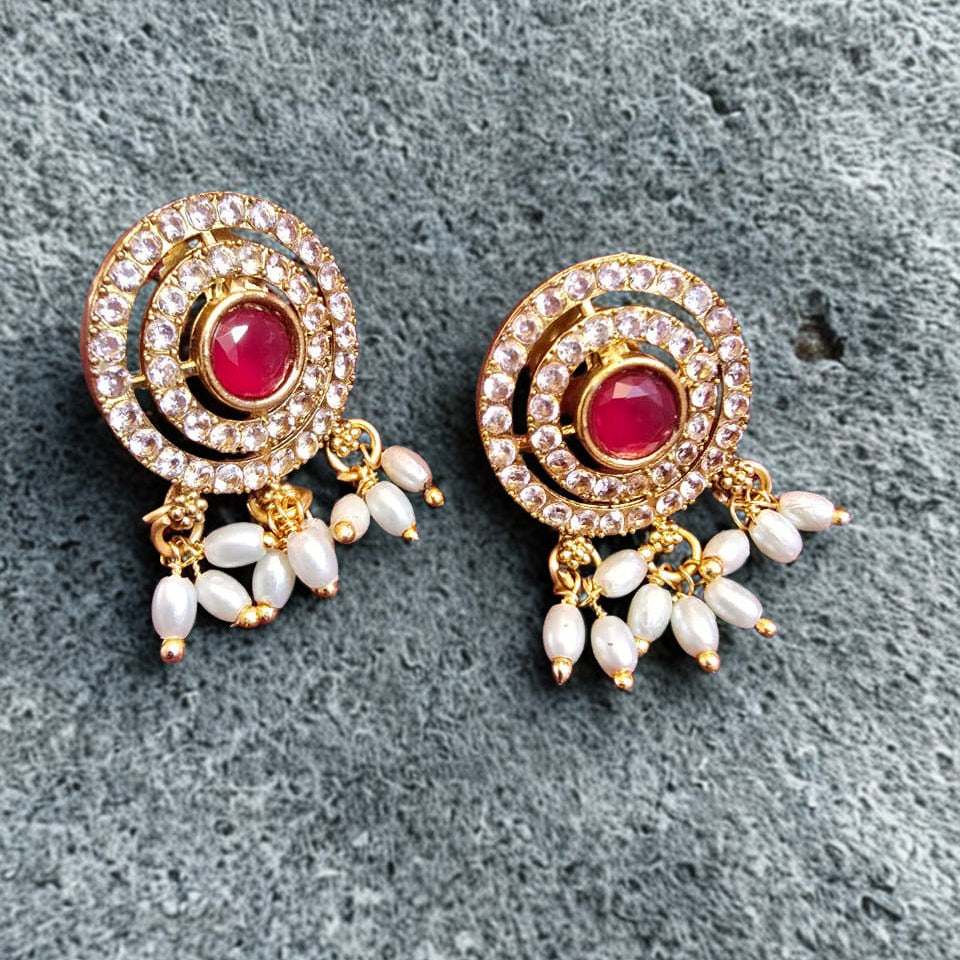 Temple elephant motif kundan necklace set with ruby stones and pearl drops with matching earrings
