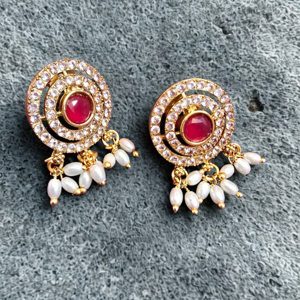 Temple elephant motif kundan necklace set with ruby stones and pearl drops with matching earrings