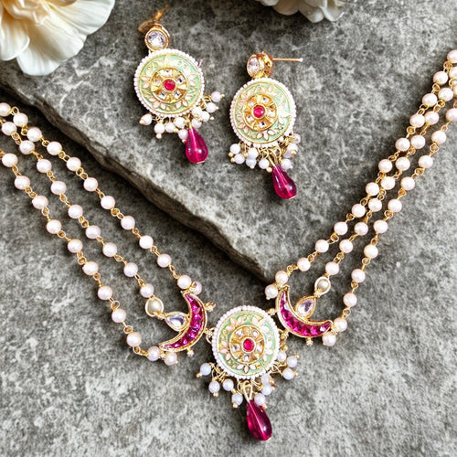 Mint enamel kundan necklace set with pearl chains and ruby drop pendant with matching earrings