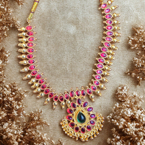 Antique ruby temple necklace set with green pendant and pearl drops with matching floral earrings